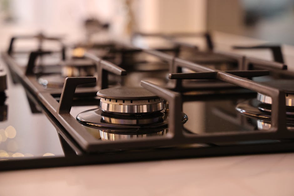 gastroback - Close-up of a modern stainless steel gas stove top, ideal for contemporary kitchens and